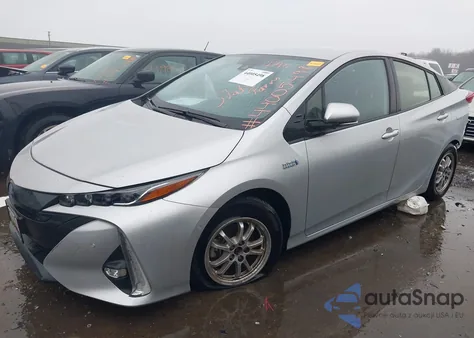 2021 Toyota Prius Prime Limited z USA, uszkodzony, nr VIN JTDKAMFP4M3193579